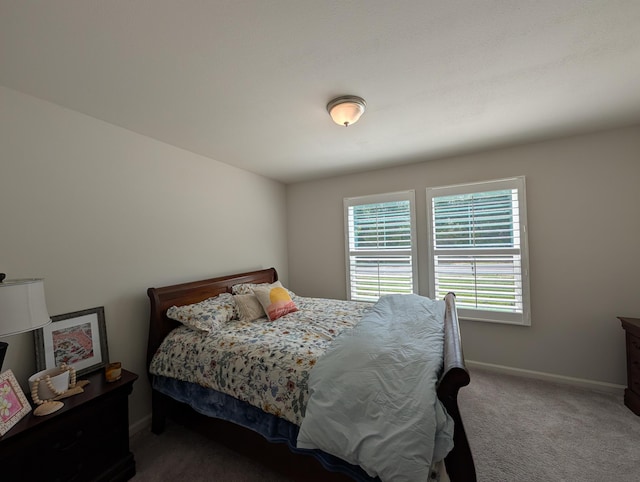 656 Hunters Ridge Rd, Defuniak Springs, FL 32433 - carpeted bedroom with baseboards