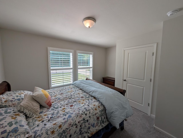 656 Hunters Ridge Rd, Defuniak Springs, FL 32433 - carpeted bedroom featuring baseboards