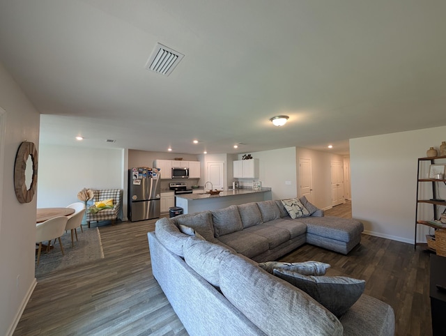 656 Hunters Ridge Rd, Defuniak Springs, FL 32433 - living area with dark wood-type flooring and recessed lighting
