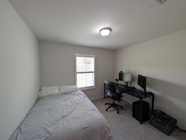 656 Hunters Ridge Rd, Defuniak Springs, FL 32433 - bedroom with carpet floors and baseboards