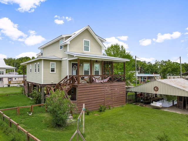 71 Childers Ln, Freeport, FL 32439 - view of front of house with a dock, a metal roof, boat lift, and stairway
