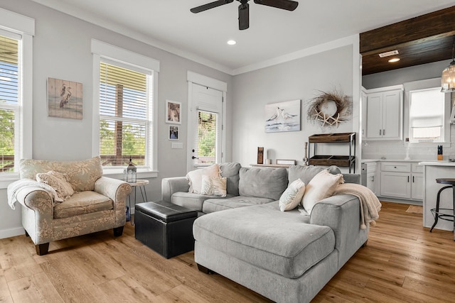 71 Childers Ln, Freeport, FL 32439 - living area featuring light wood-style floors, healthy amount of natural light, ceiling fan, recessed lighting, and ornamental molding