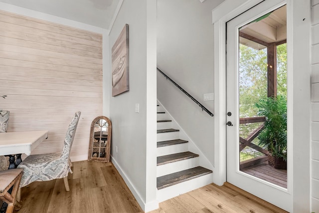 71 Childers Ln, Freeport, FL 32439 - entryway with wood finished floors, stairway, and wooden walls
