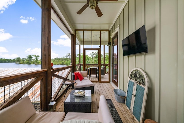 71 Childers Ln, Freeport, FL 32439 - sunroom with a ceiling fan and a water view