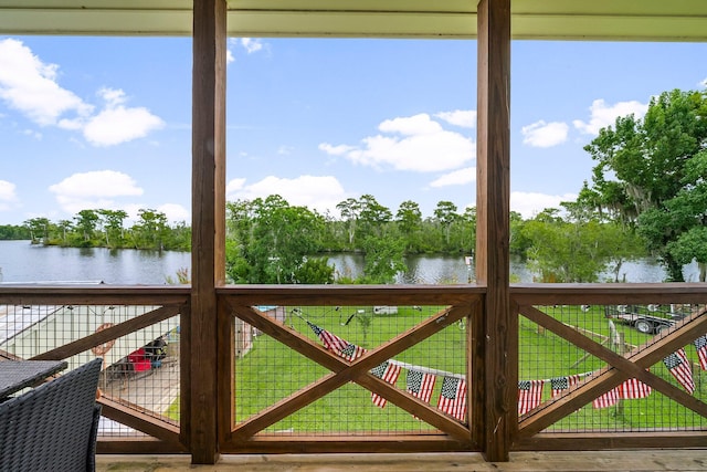 71 Childers Ln, Freeport, FL 32439 - wooden terrace with a water view