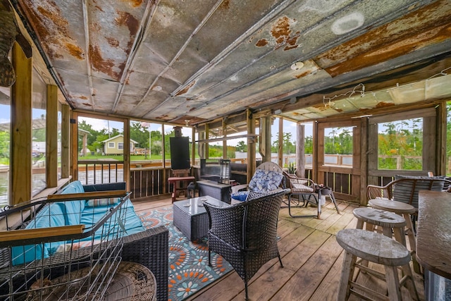 71 Childers Ln, Freeport, FL 32439 - sunroom / solarium with outdoor lounge area, healthy amount of natural light, and a water view