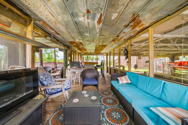 71 Childers Ln, Freeport, FL 32439 - sunroom / solarium featuring an outdoor living space and outdoor dining area