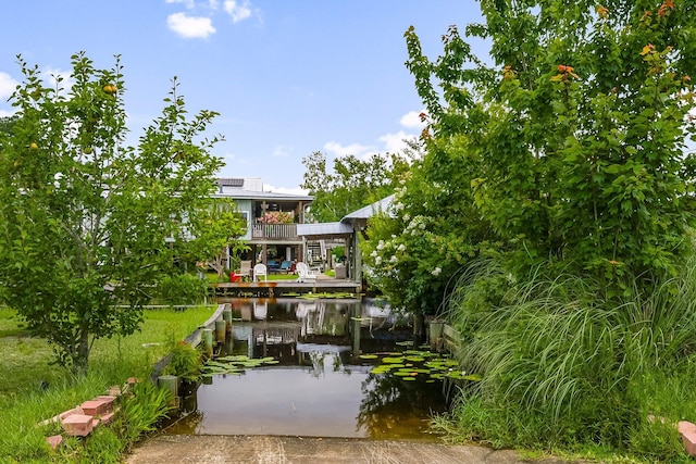 71 Childers Ln, Freeport, FL 32439 - view of community with a boat ramp, a water view, and a boat dock