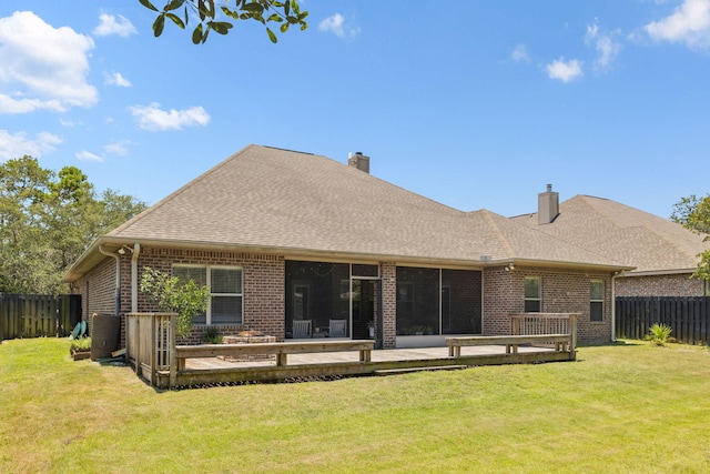 134 Mussett Bayou Ct, Santa Rosa Beach, FL 32459 - back of property with a fenced backyard, a chimney, brick siding, and a deck