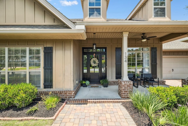 134 Mussett Bayou Ct, Santa Rosa Beach, FL 32459 - property entrance with board and batten siding, a porch, ceiling fan, and a shingled roof