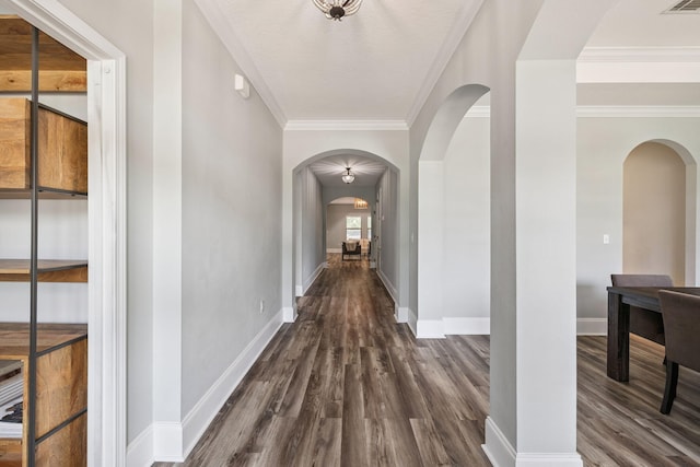 134 Mussett Bayou Ct, Santa Rosa Beach, FL 32459 - hallway featuring dark wood finished floors and arched walkways