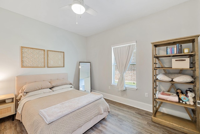 134 Mussett Bayou Ct, Santa Rosa Beach, FL 32459 - bedroom featuring wood finished floors and a ceiling fan