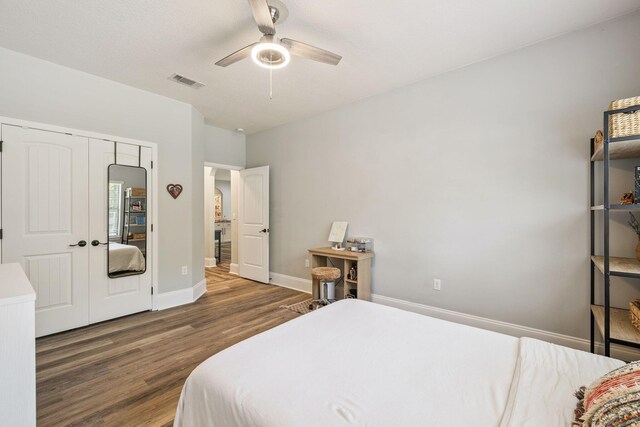 134 Mussett Bayou Ct, Santa Rosa Beach, FL 32459 - bedroom featuring wood finished floors, a closet, and ceiling fan