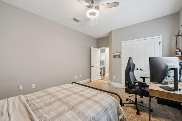 134 Mussett Bayou Ct, Santa Rosa Beach, FL 32459 - bedroom with carpet floors, a desk, a closet, and a ceiling fan