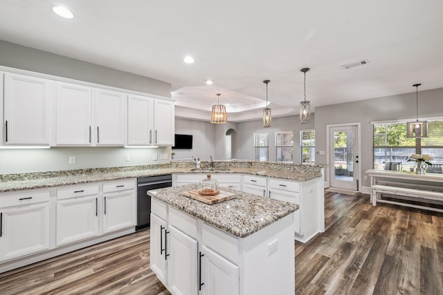134 Mussett Bayou Ct, Santa Rosa Beach, FL 32459 - kitchen featuring dishwasher, a peninsula, recessed lighting, dark wood-style floors, and white cabinets