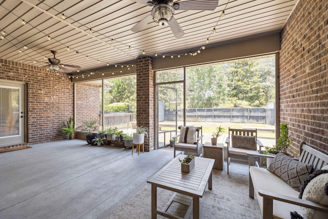 134 Mussett Bayou Ct, Santa Rosa Beach, FL 32459 - sunroom featuring a ceiling fan and outdoor lounge area