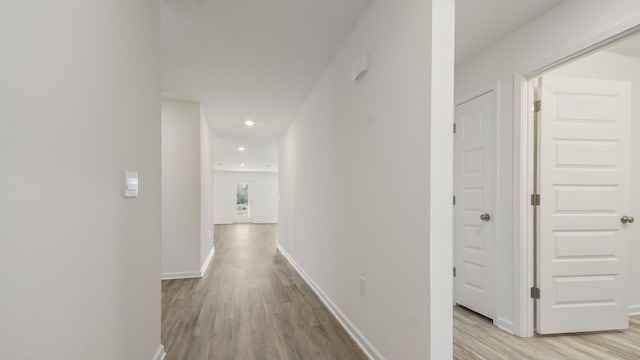 207 Eunola Ln, Freeport, FL 32439 - hallway featuring light wood finished floors and recessed lighting