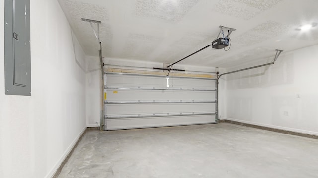 207 Eunola Ln, Freeport, FL 32439 - garage with electric panel and a garage door opener
