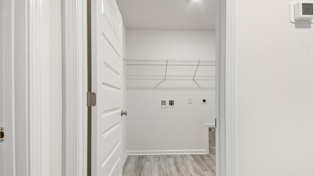 207 Eunola Ln, Freeport, FL 32439 - laundry area with hookup for an electric dryer, hookup for a washing machine, and light wood-style flooring