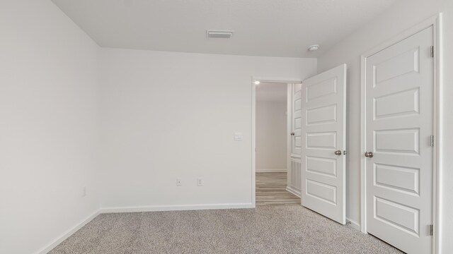 207 Eunola Ln, Freeport, FL 32439 - unfurnished bedroom featuring light carpet