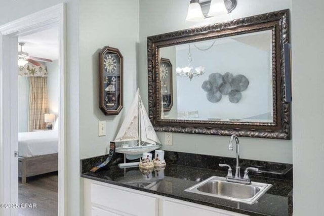 15817 Front Beach Rd # 706, Panama City Beach, FL 32413 - bar area featuring a sink and a chandelier