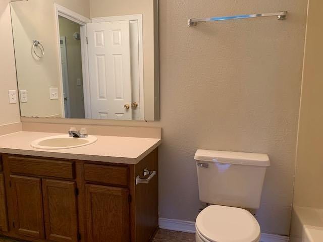 507 Chinas Cv Unit C, Fort Walton Beach, FL 32547 - full bathroom with vanity and a tub to relax in