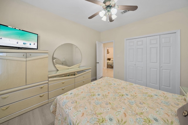 94 Terra Cotta Way, Destin, FL 32541 - bedroom featuring wood finished floors, a closet, and ceiling fan