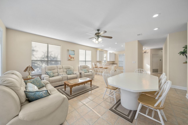 94 Terra Cotta Way, Destin, FL 32541 - living area featuring ceiling fan, light tile patterned flooring, recessed lighting, and a chandelier