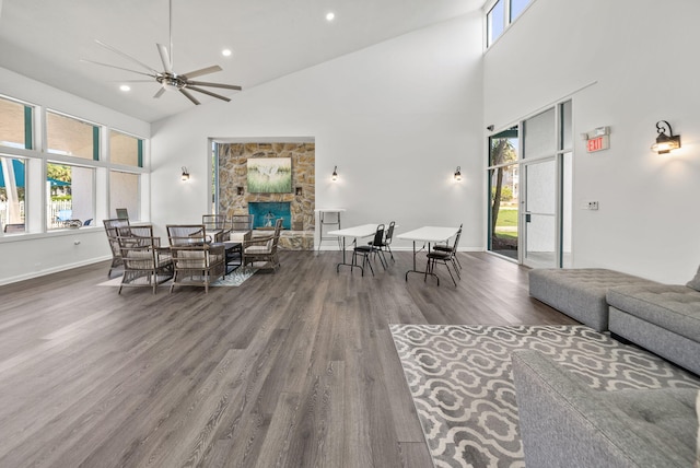 94 Terra Cotta Way, Destin, FL 32541 - living room with a towering ceiling, a ceiling fan, healthy amount of natural light, wood finished floors, and recessed lighting
