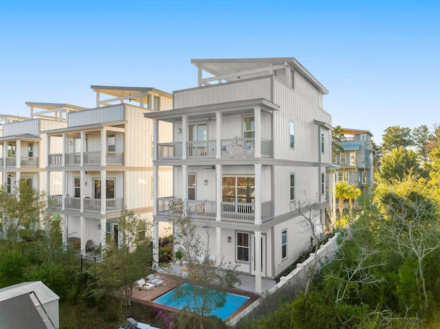28 W Queen Palm Dr, Inlet Beach, FL 32461 - back of property with a balcony