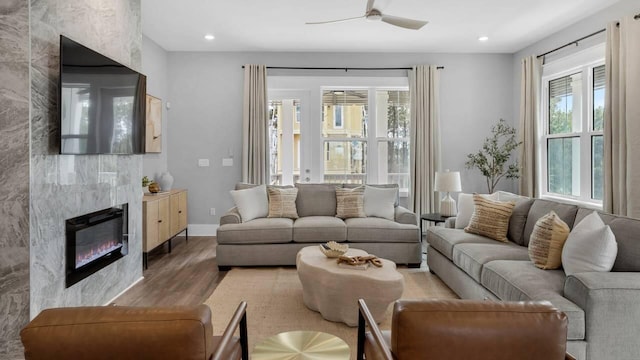 28 W Queen Palm Dr, Inlet Beach, FL 32461 - living room with wood finished floors, a ceiling fan, a large fireplace, and recessed lighting
