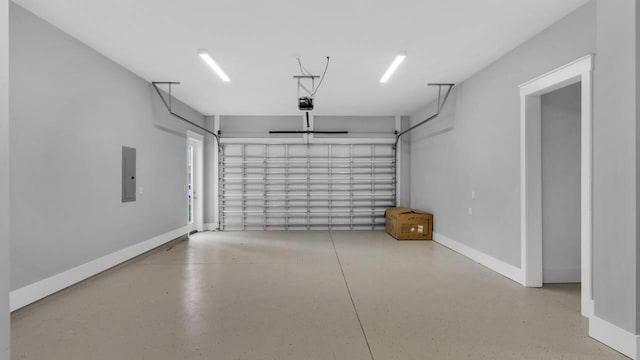 28 W Queen Palm Dr, Inlet Beach, FL 32461 - garage with electric panel and a garage door opener