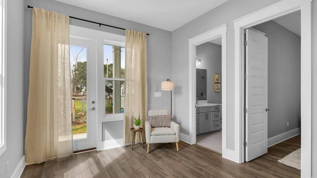 28 W Queen Palm Dr, Inlet Beach, FL 32461 - sitting room with dark wood-style floors and baseboards