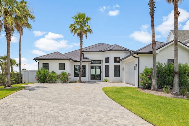 31 Driftwood Ct, Santa Rosa Beach, FL 32459 - modern farmhouse with a standing seam roof, stucco siding, and a metal roof