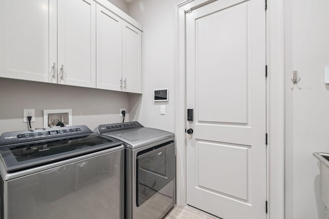 31 Driftwood Ct, Santa Rosa Beach, FL 32459 - laundry room featuring cabinet space and washing machine and dryer