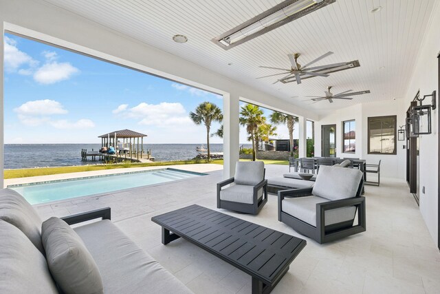 31 Driftwood Ct, Santa Rosa Beach, FL 32459 - view of patio / terrace with an outdoor hangout area, a water view, and outdoor dining space
