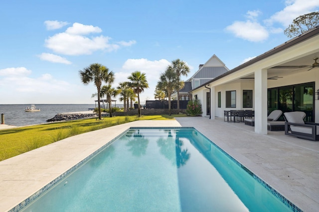 31 Driftwood Ct, Santa Rosa Beach, FL 32459 - outdoor pool with a water view, a patio area, ceiling fan, and a yard
