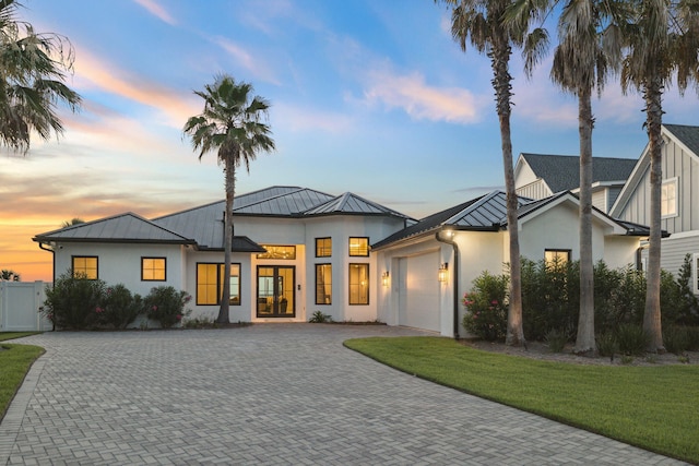 31 Driftwood Ct, Santa Rosa Beach, FL 32459 - modern farmhouse with a standing seam roof and stucco siding