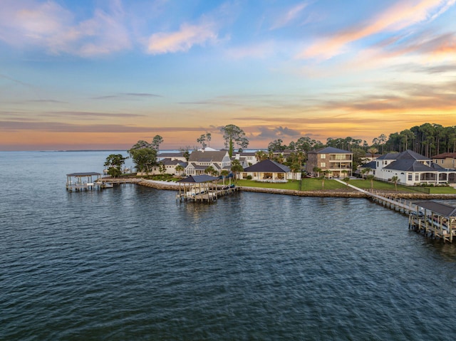 31 Driftwood Ct, Santa Rosa Beach, FL 32459 - water view with nearby suburban area and a dock