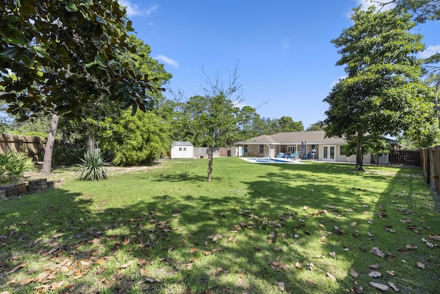 497 Walton Way, Miramar Beach, FL 32550 - fenced backyard with a shed