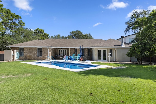 497 Walton Way, Miramar Beach, FL 32550 - rear view of property featuring french doors, an outdoor pool, a yard, a patio area, and roof with shingles