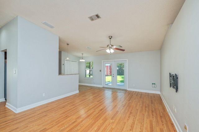 8562 Vehlin Ct, Navarre, FL 32566 - unfurnished living room featuring light wood-style floors and ceiling fan
