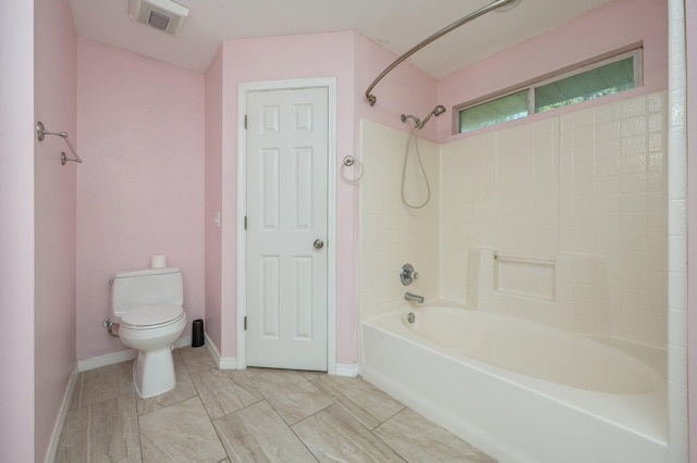 8562 Vehlin Ct, Navarre, FL 32566 - bathroom featuring bathing tub / shower combination and toilet