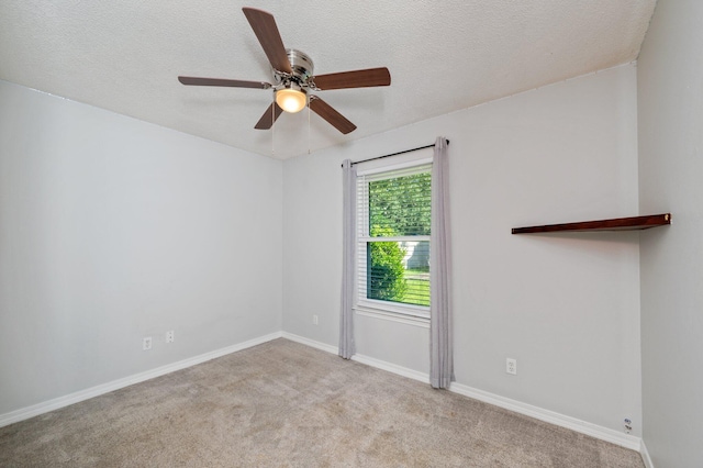 8562 Vehlin Ct, Navarre, FL 32566 - carpeted spare room featuring a ceiling fan and a textured ceiling