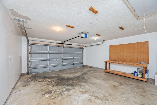 8562 Vehlin Ct, Navarre, FL 32566 - garage featuring a garage door opener and baseboards