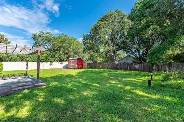 8562 Vehlin Ct, Navarre, FL 32566 - fenced backyard featuring a storage unit, a pergola, and a patio area
