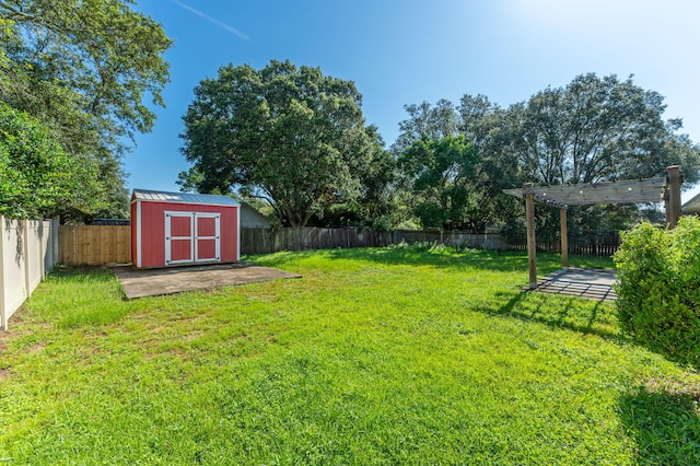 8562 Vehlin Ct, Navarre, FL 32566 - fenced backyard featuring a shed, a pergola, and a patio