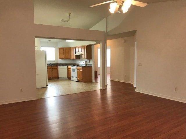 294 Limestone Cir, Crestview, FL 32539 - unfurnished living room with ceiling fan, dark wood-style floors, and high vaulted ceiling