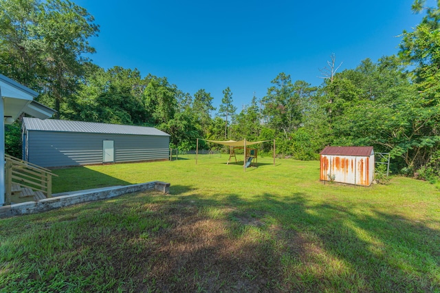 5358 Cox Ln, Crestview, FL 32539 - view of grassy yard featuring a storage unit