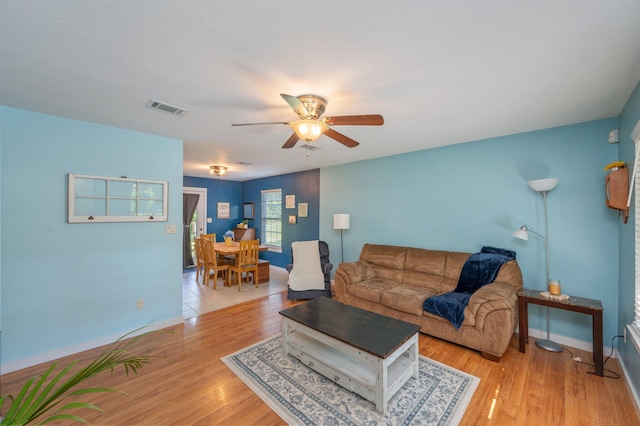 5358 Cox Ln, Crestview, FL 32539 - living area featuring ceiling fan and light wood finished floors